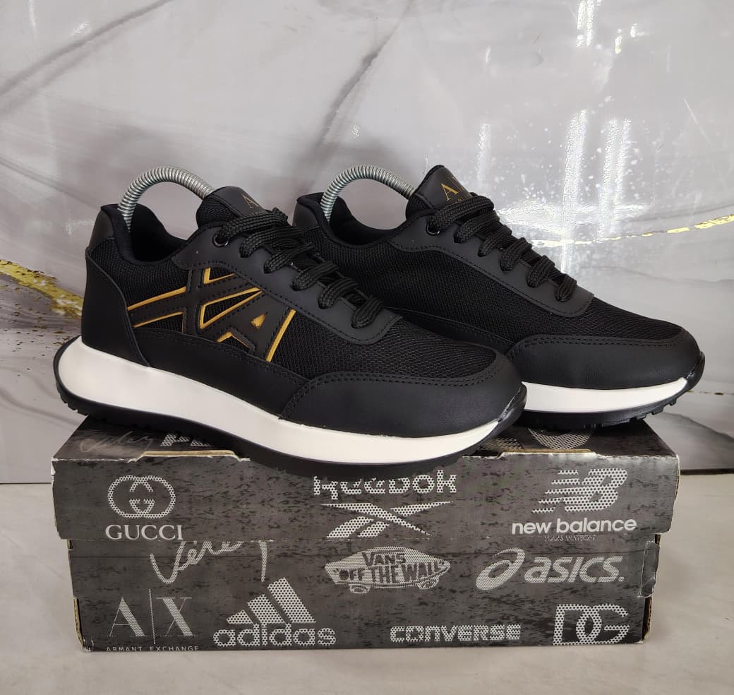 AX Armani Negro Dorado